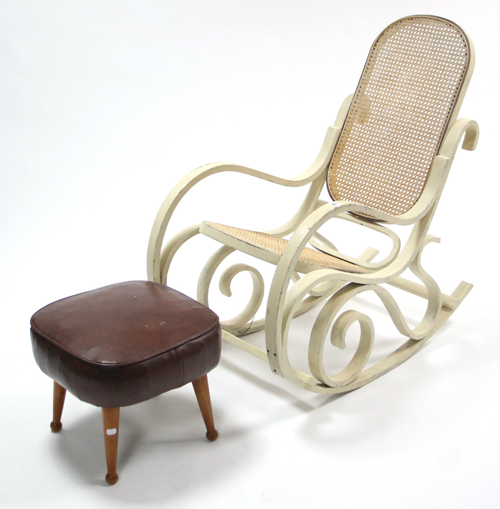 A white painted bentwood rocking chair inset woven-cane panel to the seat & back; & a brown