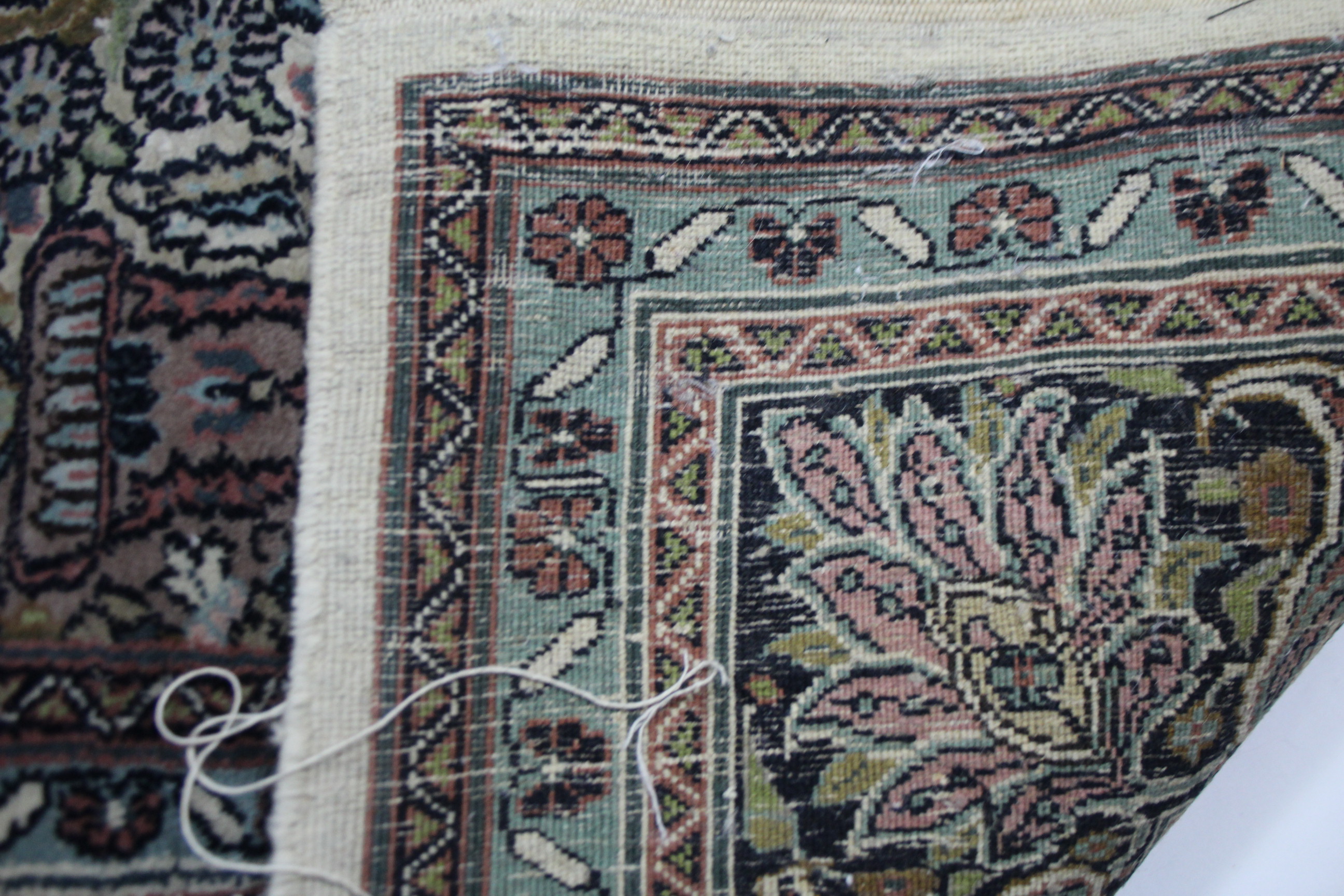 A Persian pattern rug of ivory & pale blue ground, with multi-coloured geometric, floral & animal - Image 4 of 6