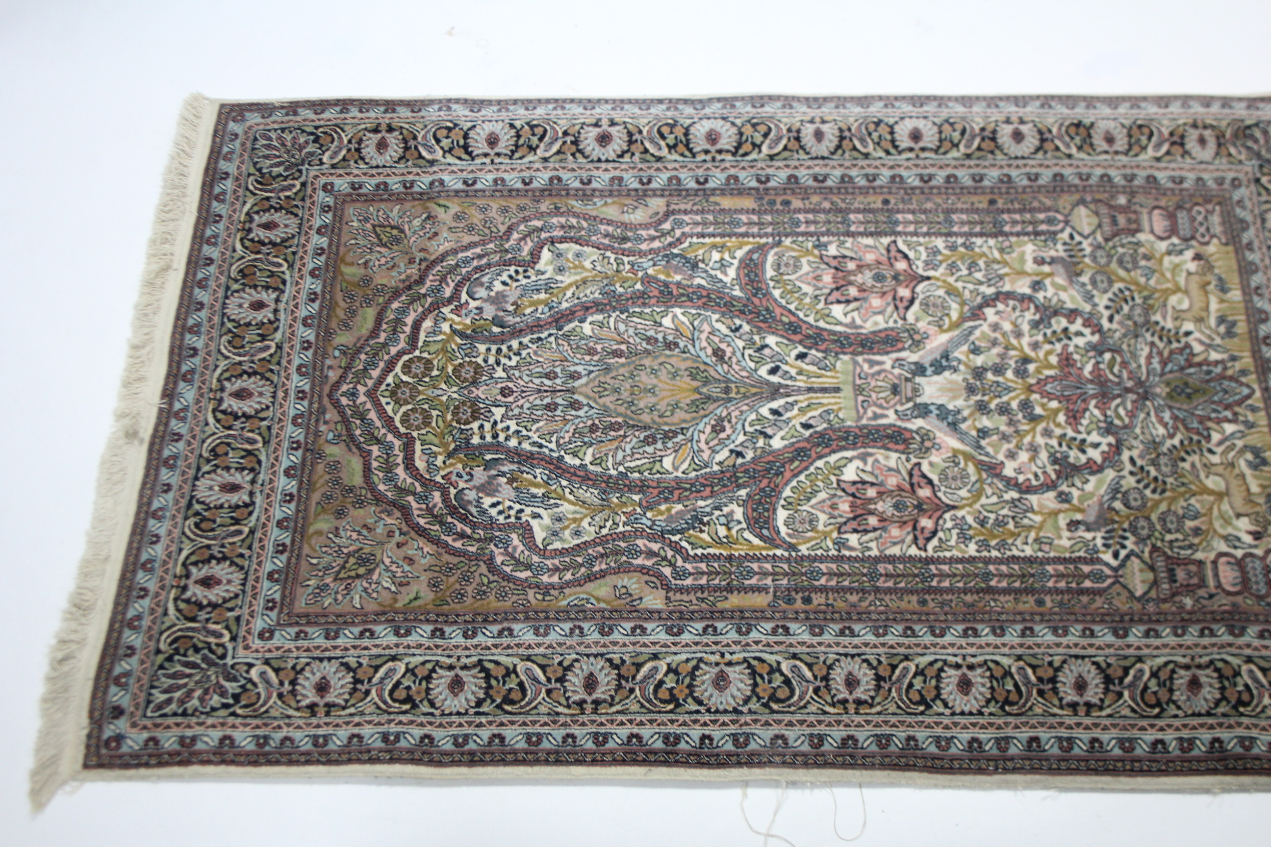 A Persian pattern rug of ivory & pale blue ground, with multi-coloured geometric, floral & animal - Image 2 of 6