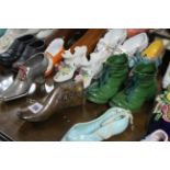 A collection of approximately forty various shoe ornaments.