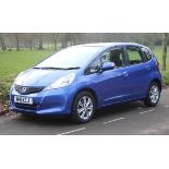 A HONDA JAZZ FIVE-DOOR HATCHBACK MOTOR CAR in metallic blue, automatic transmission, 1300cc petrol