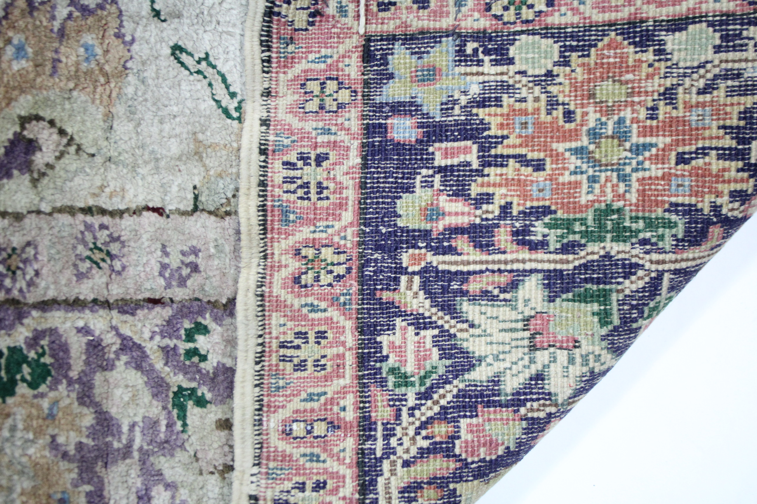 A Persian pattern rug of ivory & pale blue ground, with multi-coloured geometric, floral & animal - Image 6 of 6