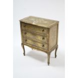 A continental-style gold & grey painted wooden small chest fitted three long drawers, & on short