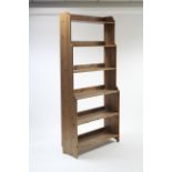 A pine tall standing six-tier open bookcase, 36½” wide x 79” high.