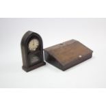 A late 19th/early 20th century mahogany sloping-front box, 23” wide; & an Ansonia Clock Co. (