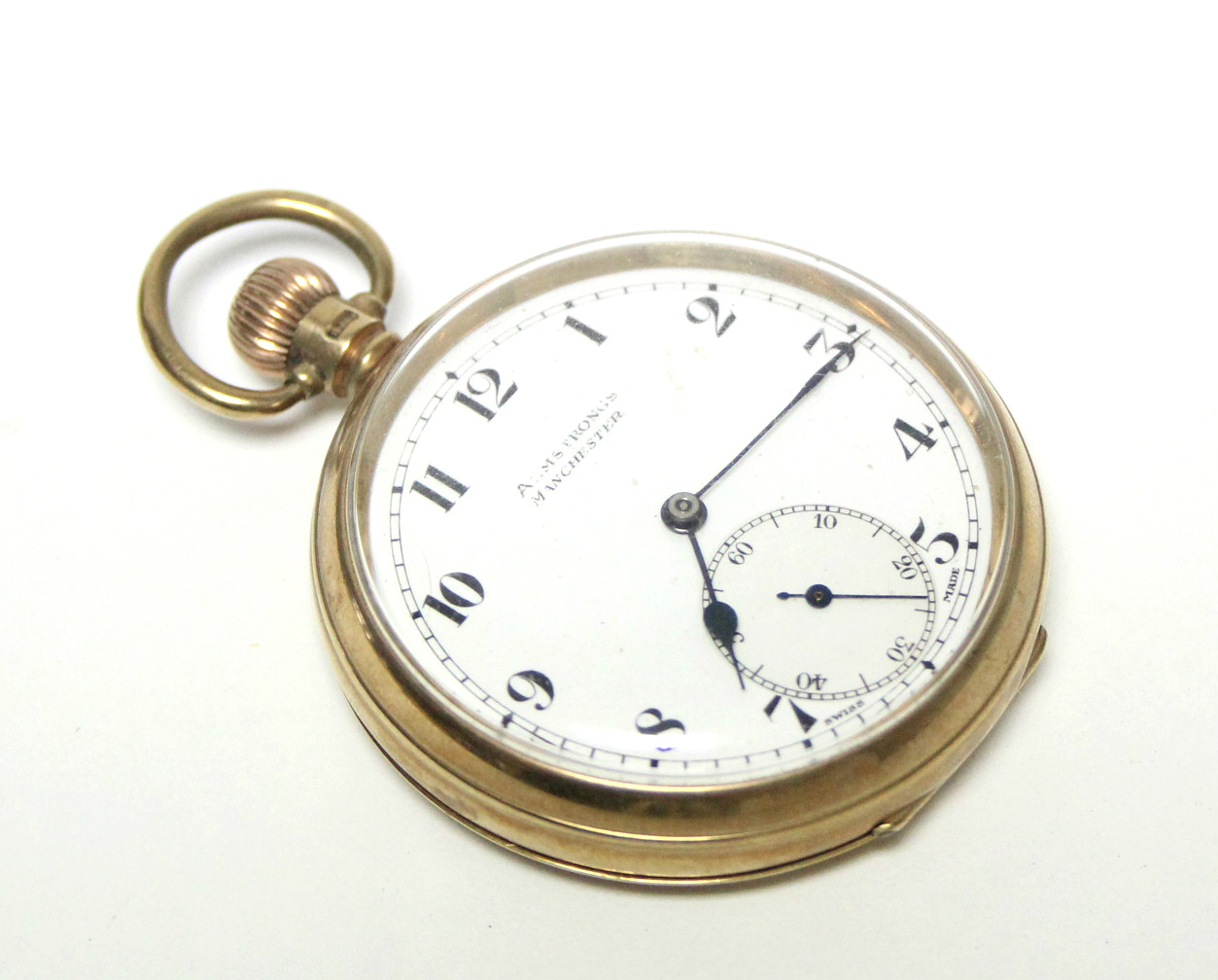 A 9ct. gold cased open-face gent’s pocket watch with Swiss movement, the white enamel dial with