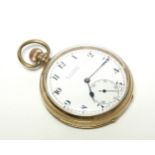 A 9ct. gold cased open-face gent’s pocket watch with Swiss movement, the white enamel dial with