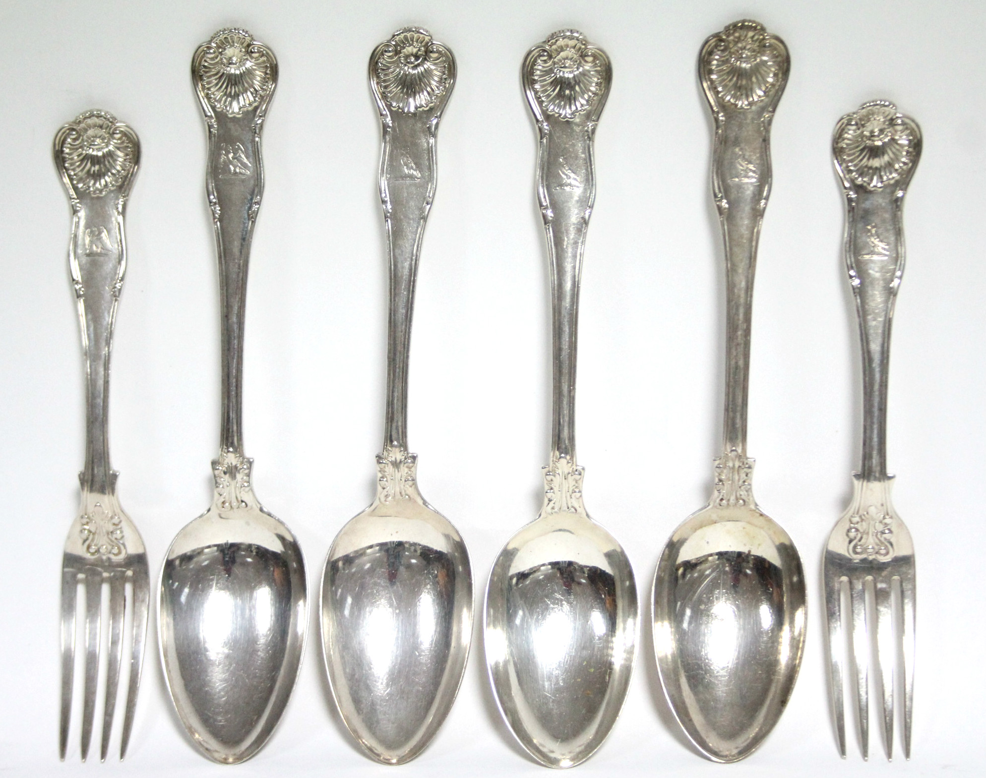 A pair of William IV King’s Husk pattern table spoons, London 1836; another pair 1839; & matching