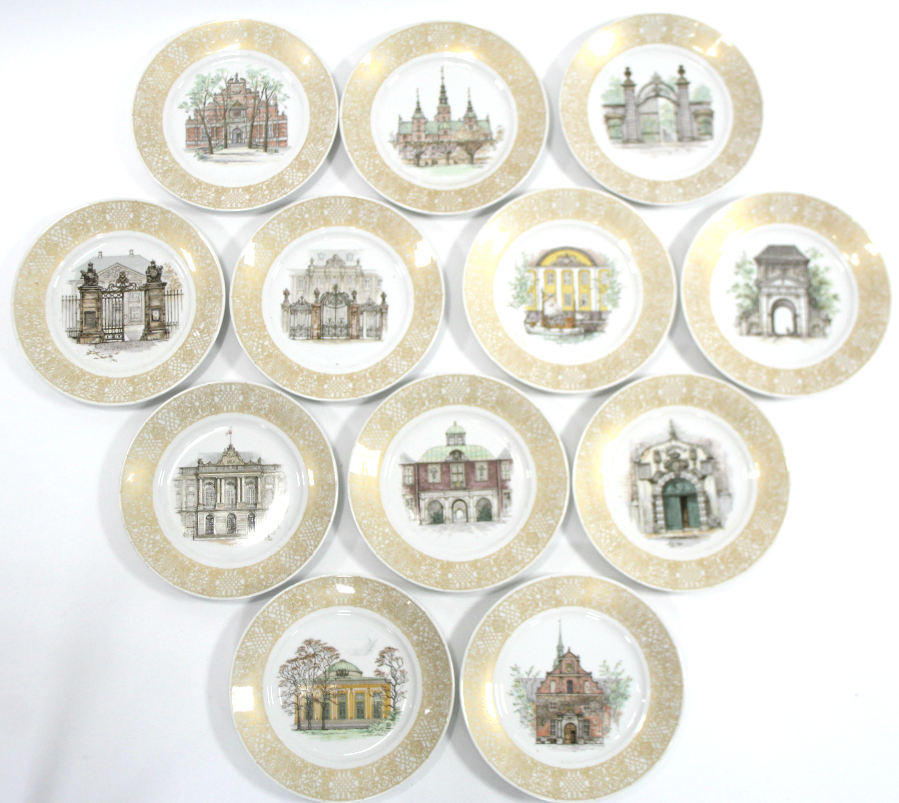 A set of twelve Royal Copenhagen porcelain “Portraits of Old Copenhagen” plates; 10½” diam.
