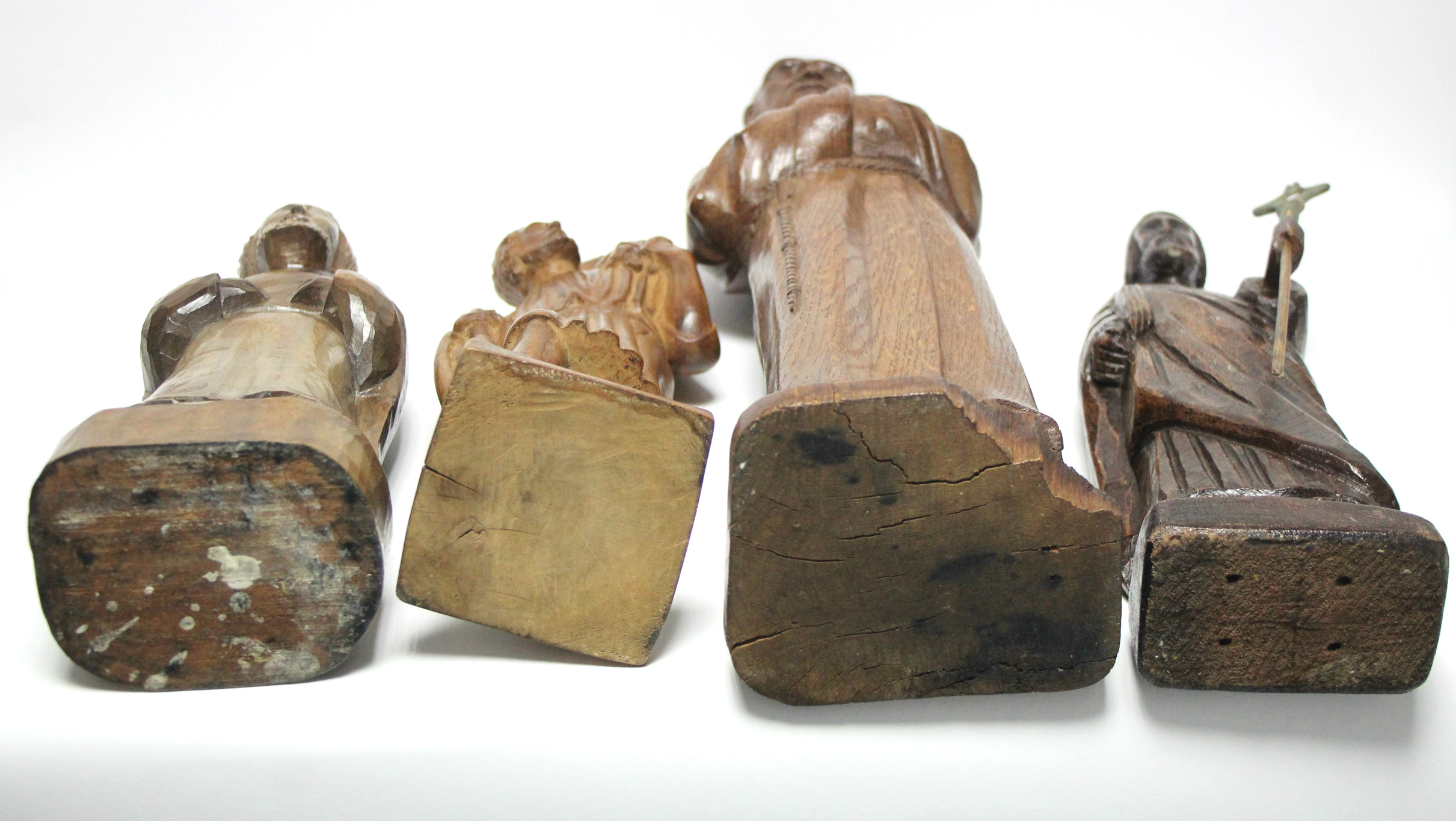 A carved oak standing figure of a monk, 20” high; & three other smaller carved wood religious - Image 4 of 4