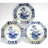 Three 18th century Bow blue-&-white porcelain octagonal plates, each painted with peonies &