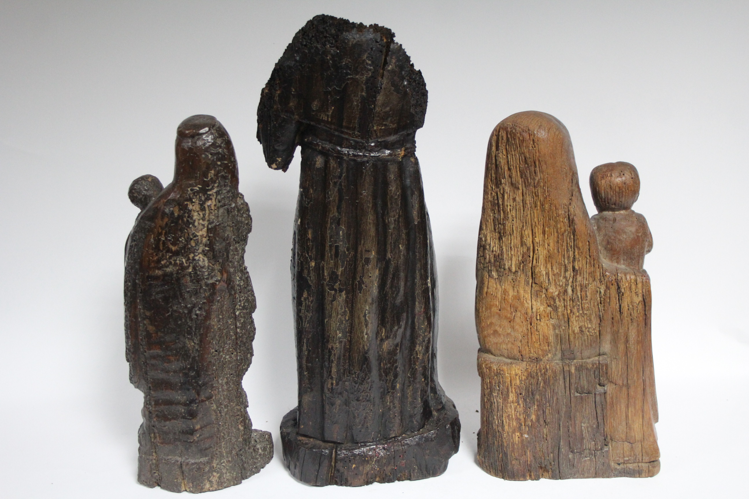 An early carved wood standing robed figure with traces of painted decoration, 18½” high (lacking - Image 5 of 7