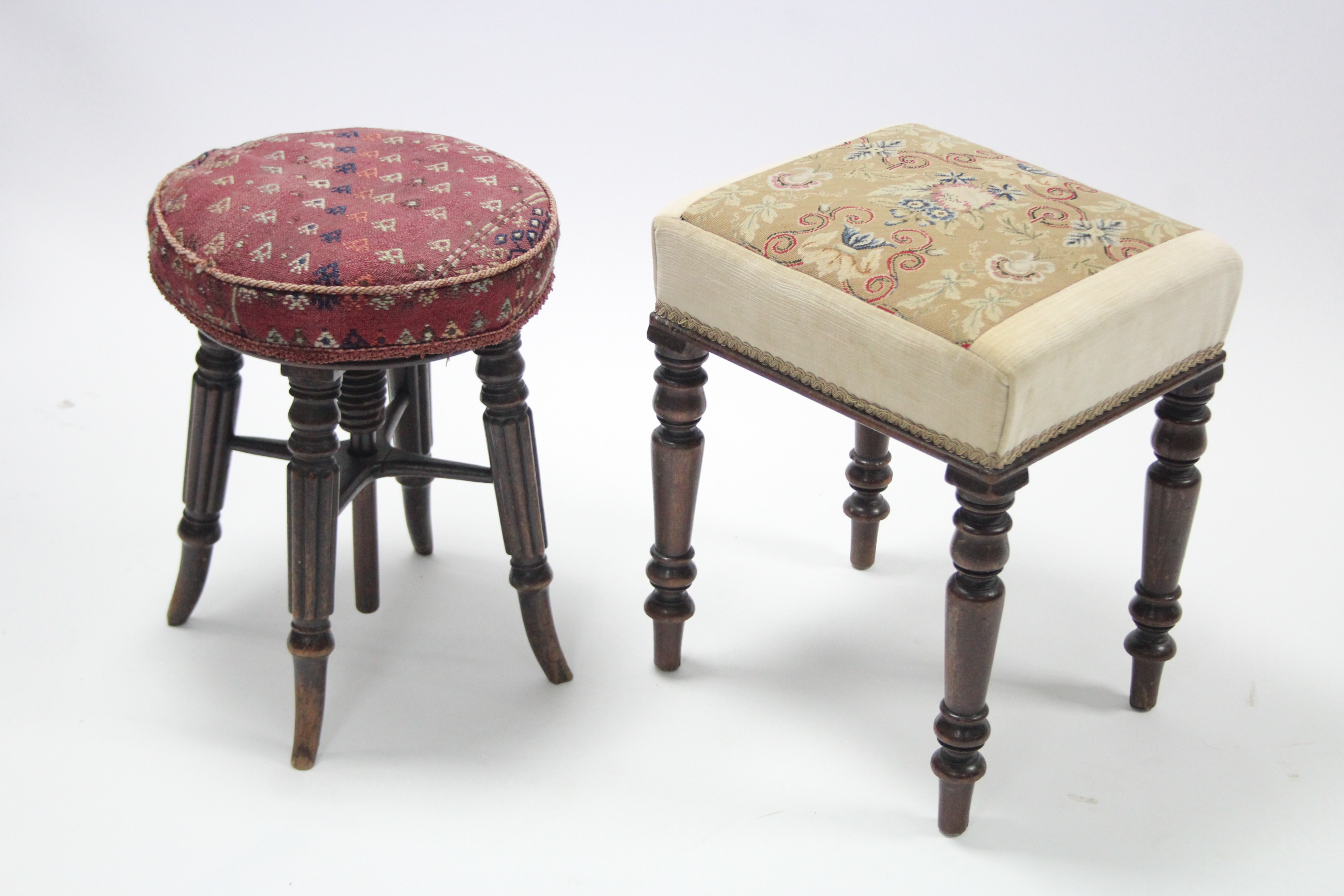 An early Victorian mahogany rectangular stool with padded seat upholstered floral material, on