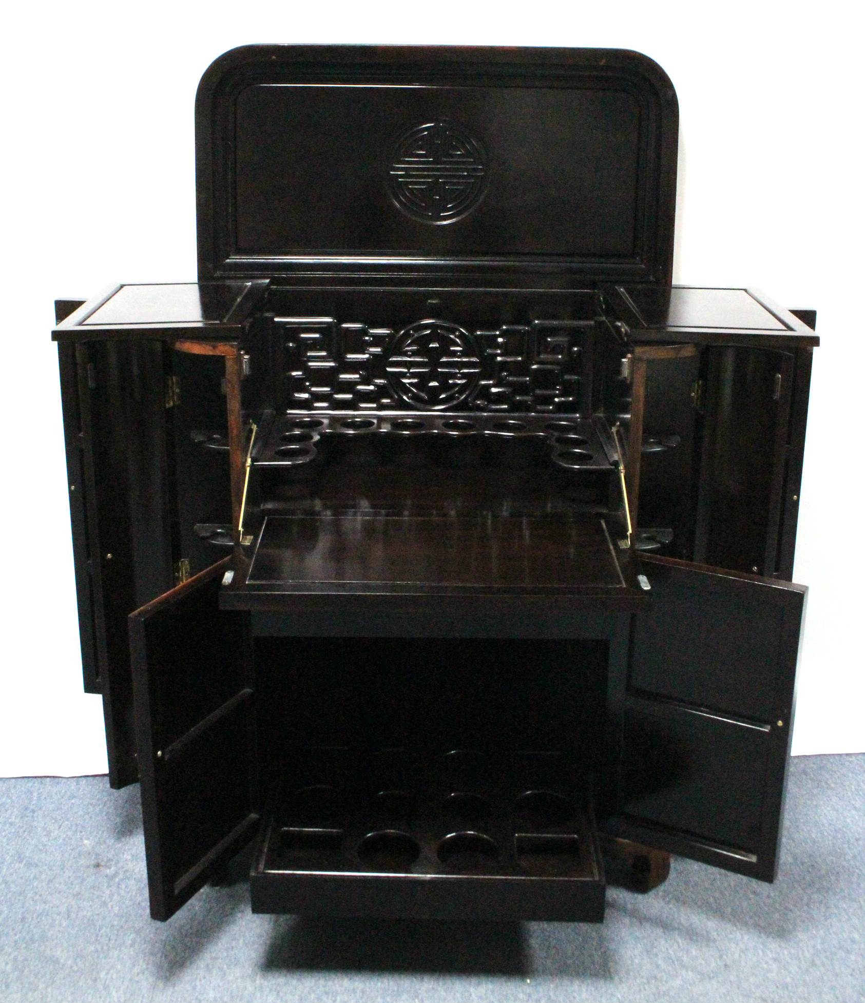 An early/mid-20th century Chinese carved hardwood drinks cabinet with lift top & fall front, - Image 6 of 8