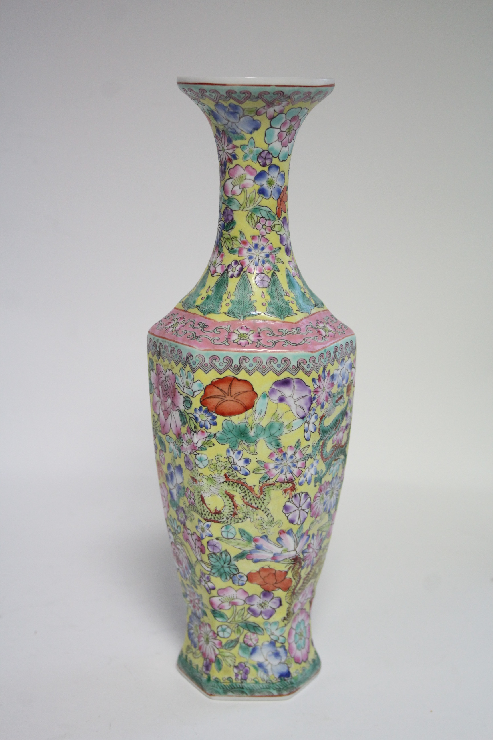 A 20th century Chinese yellow-ground eggshell porcelain slender hexagonal baluster vase with all- - Image 3 of 7