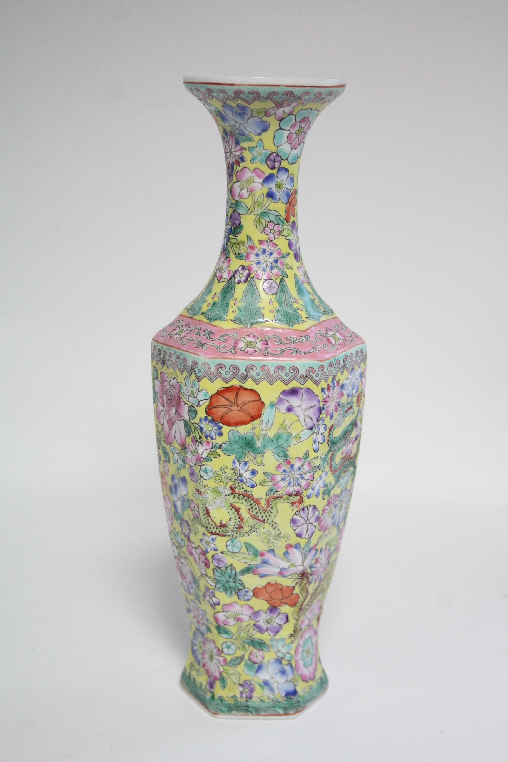 A 20th century Chinese yellow-ground eggshell porcelain slender hexagonal baluster vase with all- - Image 2 of 7