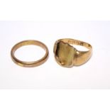 An 18ct. gold wedding band; & an 18ct. signet ring – the hardstone matrix missing. (6.8gm total).