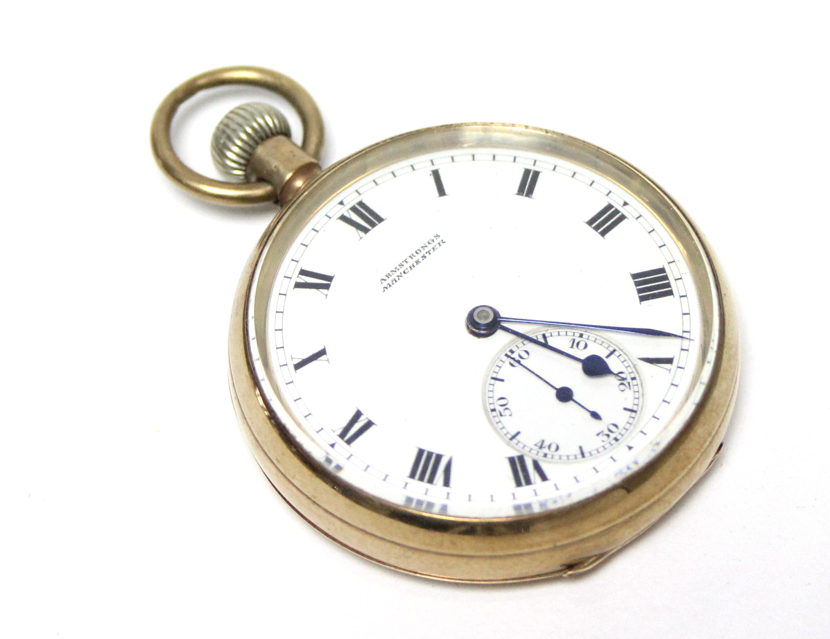 A 9ct. gold cased open-faced gent’s pocket watch, the white enamel dial with black roman