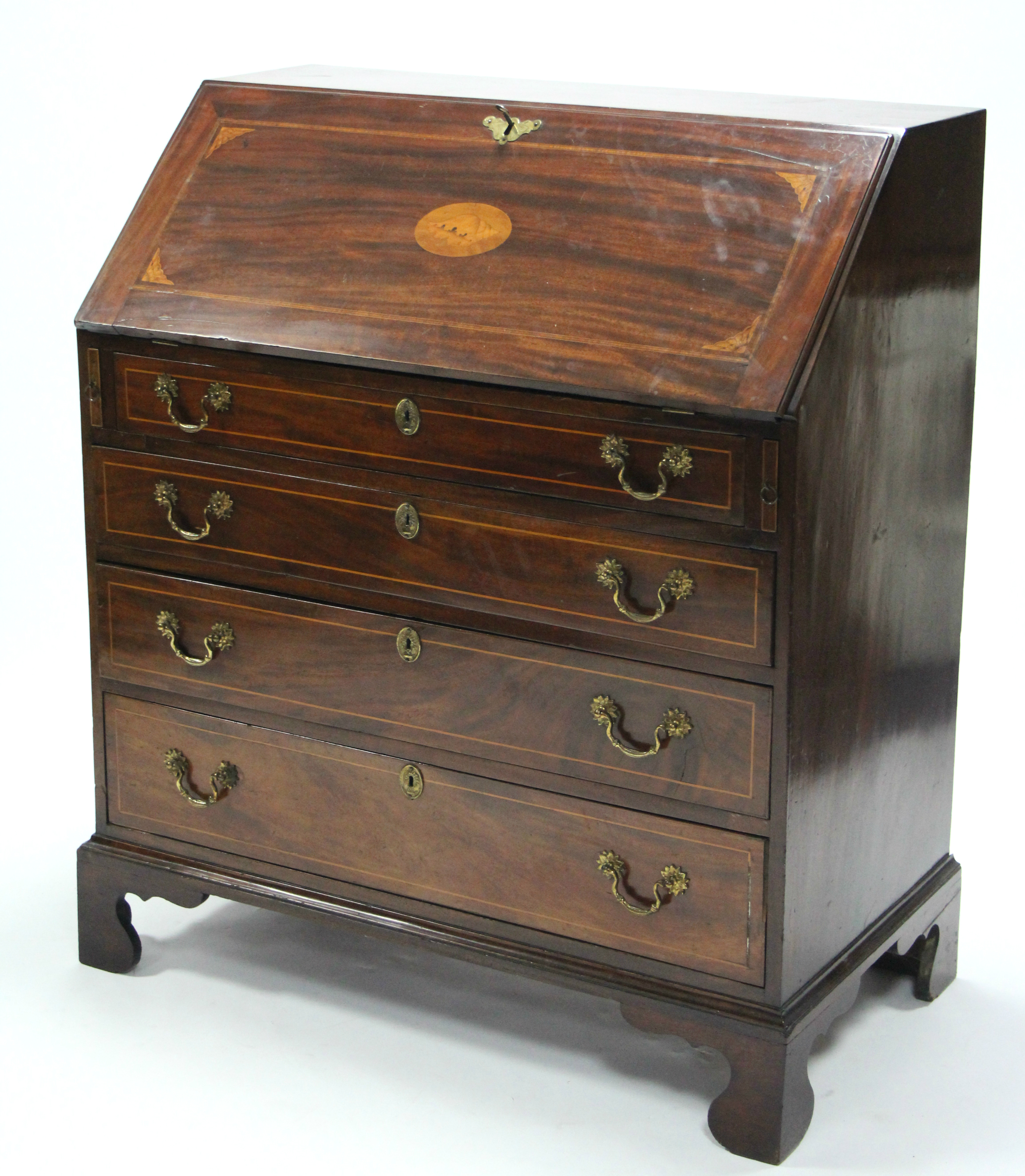 A George III inlaid-mahogany bureau, the sloping fall-front enclosing a fitted interior, with