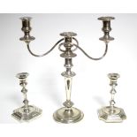 A pair of George I style candlesticks with square baluster columns, 6¾” high; & a twin-branch
