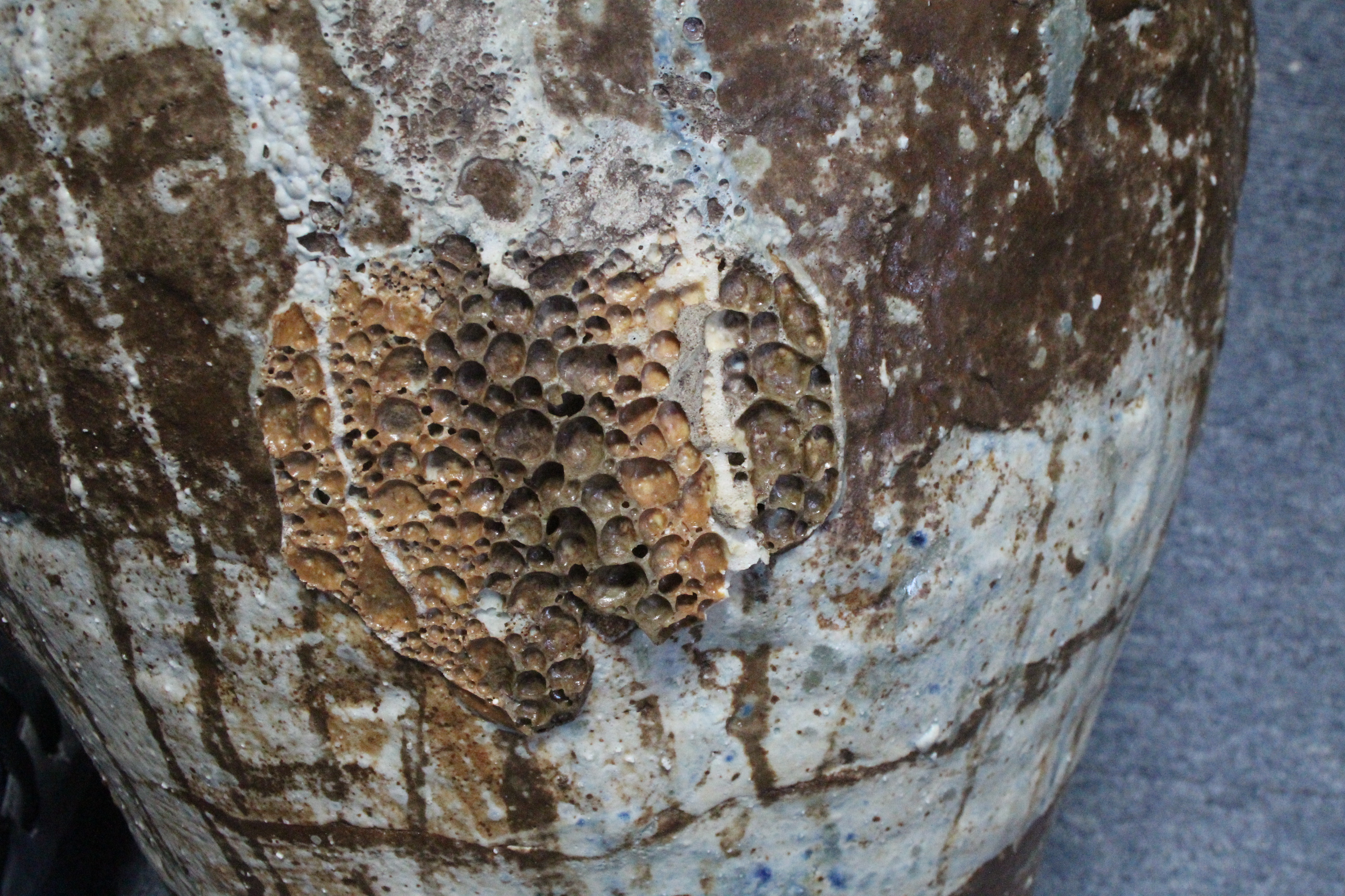 EWEN HENDERSON (1934-2000). A large studio pottery round tapered vase with a rough “Volcanic” - Image 4 of 5