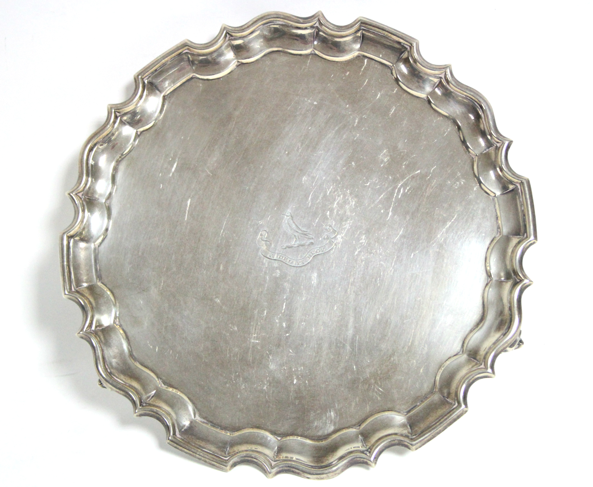 A late Victorian salver with raised pie-crust edge & engraved family crest, on three scroll feet, - Image 2 of 5