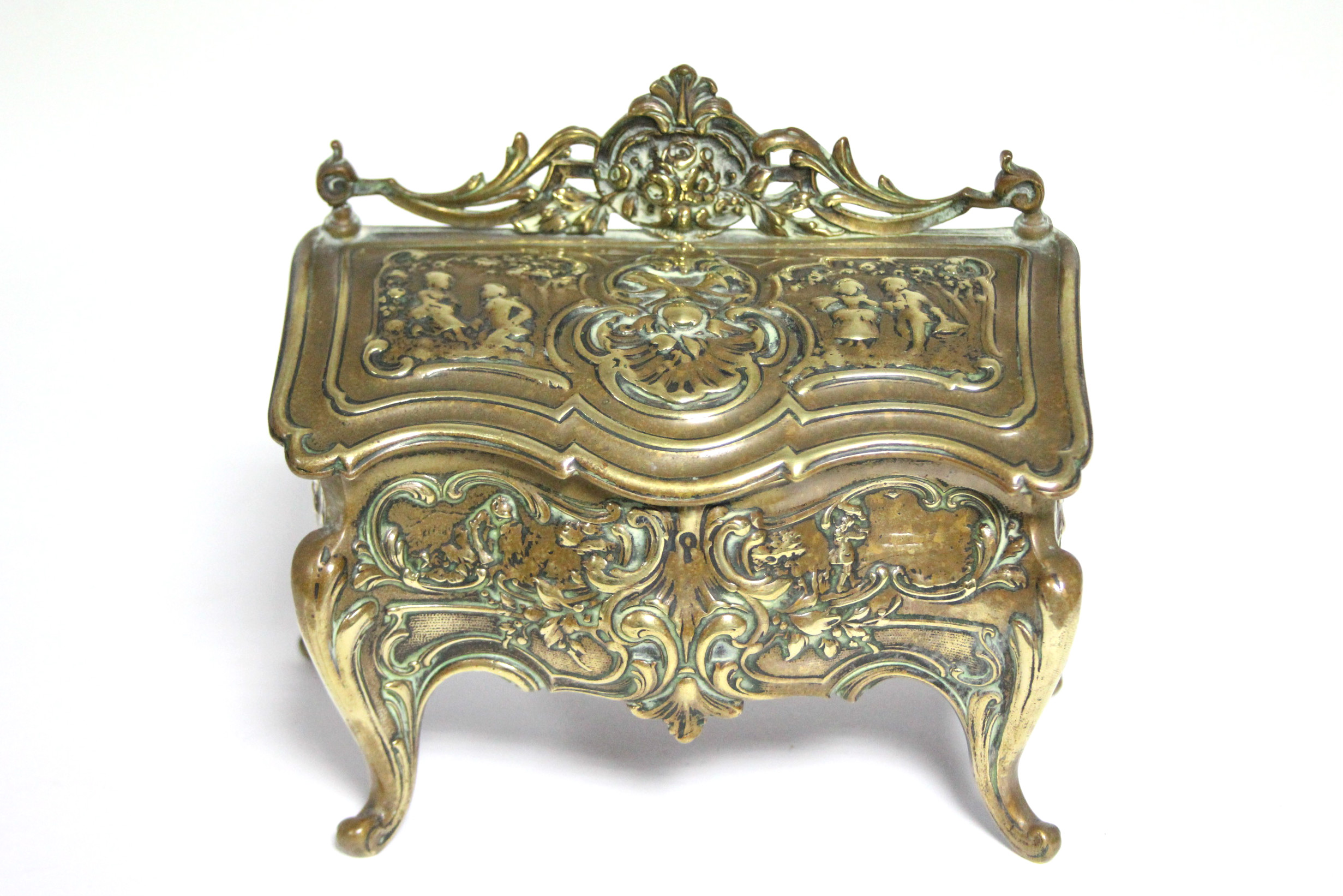 A late 19th century brass double inkwell in the form of Louis XV bureau with sloping hinged lid,