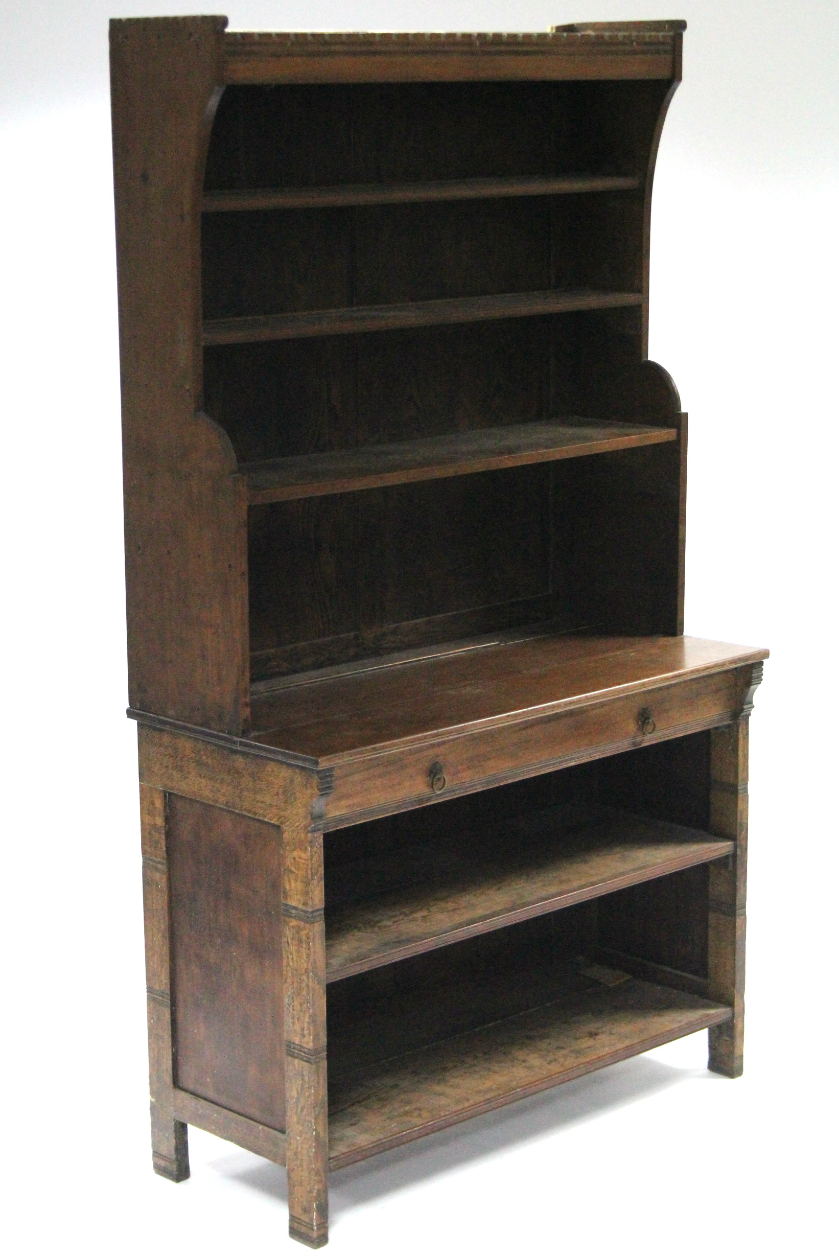 A Victorian aesthetic-style bookcase section, the upper part fitted three shelves, a further two