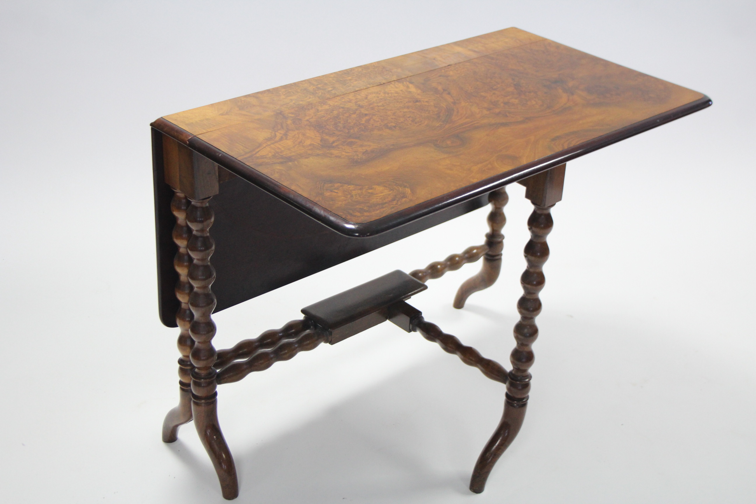 A Victorian burr-walnut Sutherland table on bobbin-turned supports with curved legs; 36” wide. - Image 2 of 4