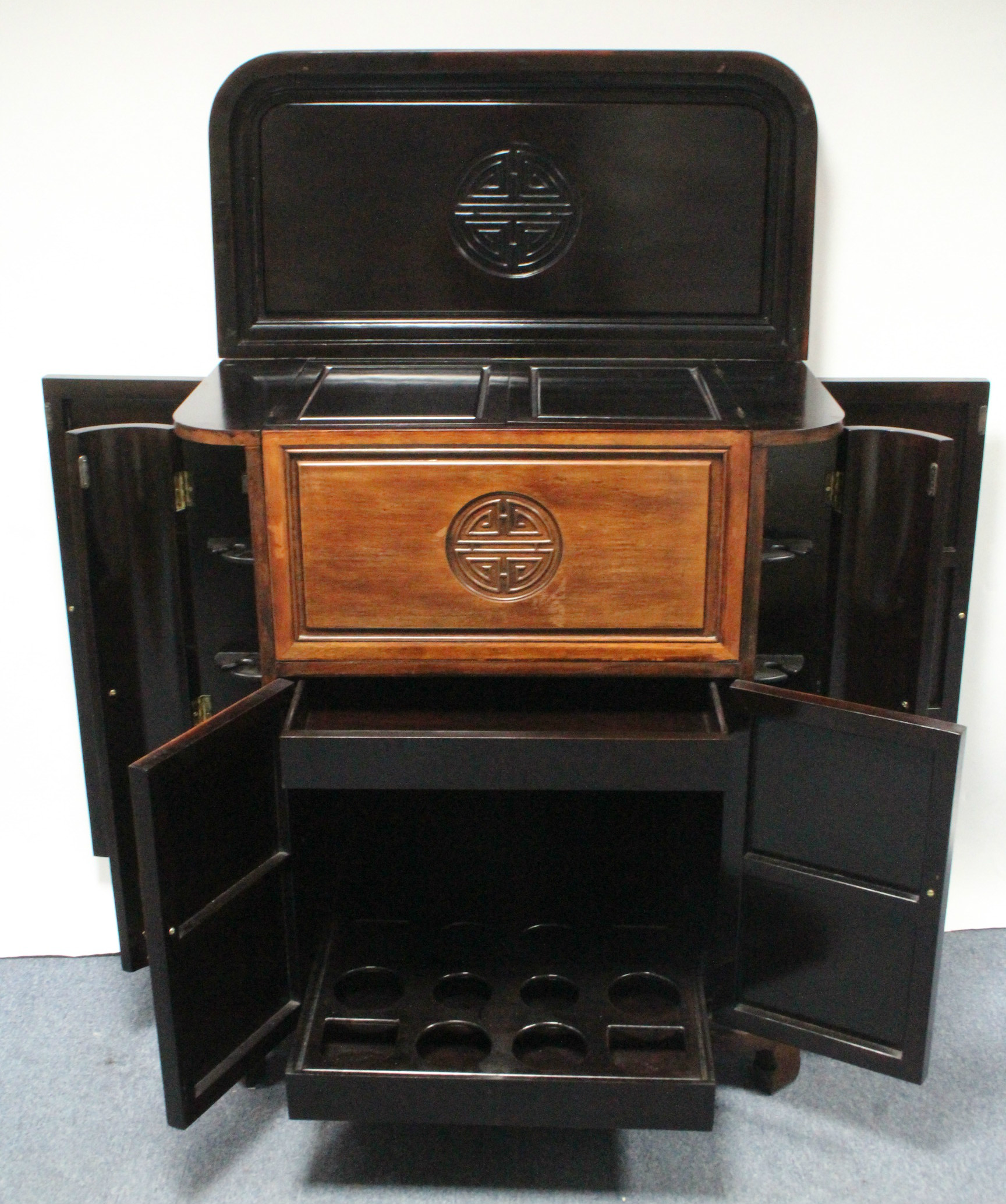 An early/mid-20th century Chinese carved hardwood drinks cabinet with lift top & fall front, - Image 3 of 8