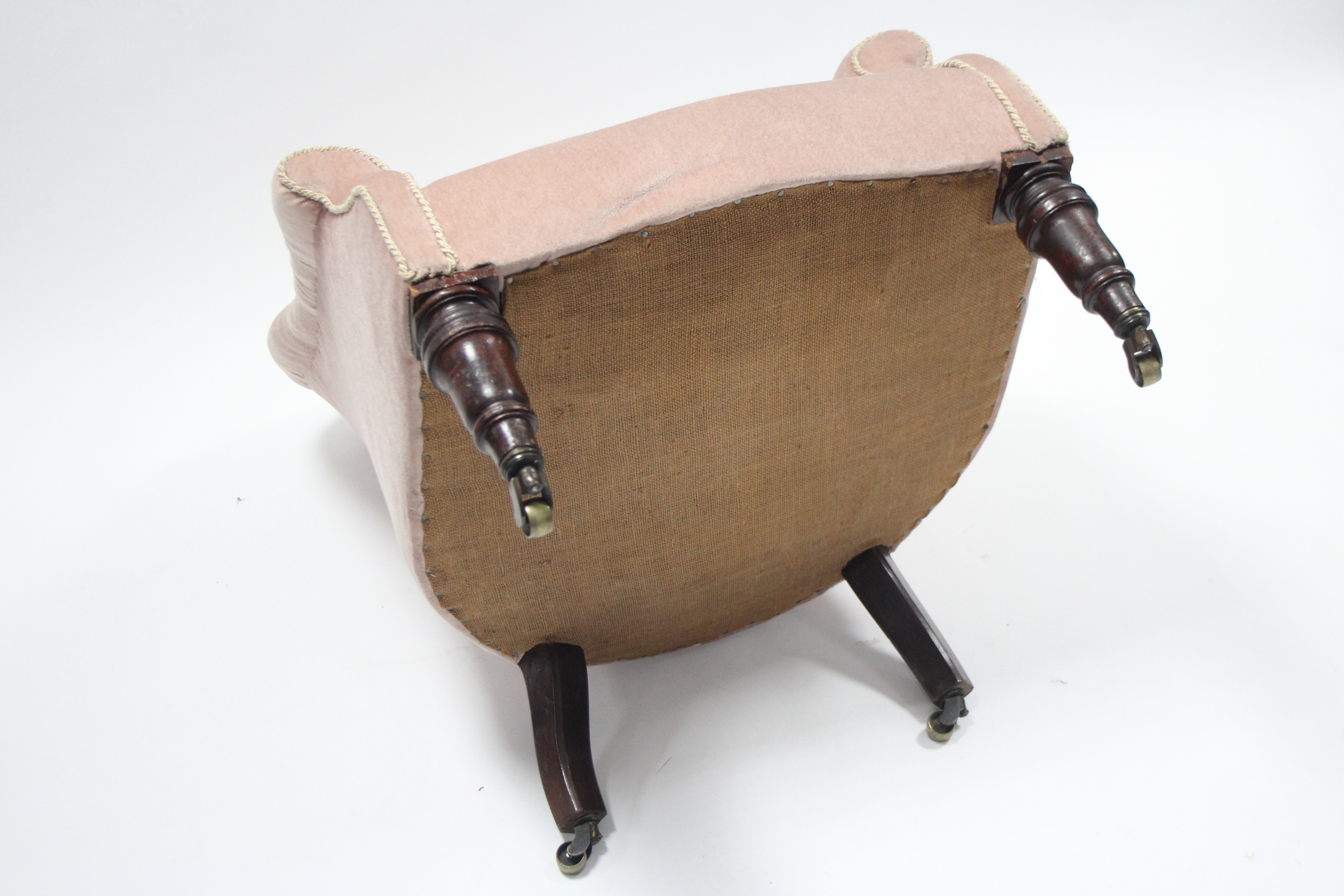 A mid-Victorian tub-shaped armchair, the buttoned back, arms & sprung seat upholstered salmon-pink - Image 3 of 3