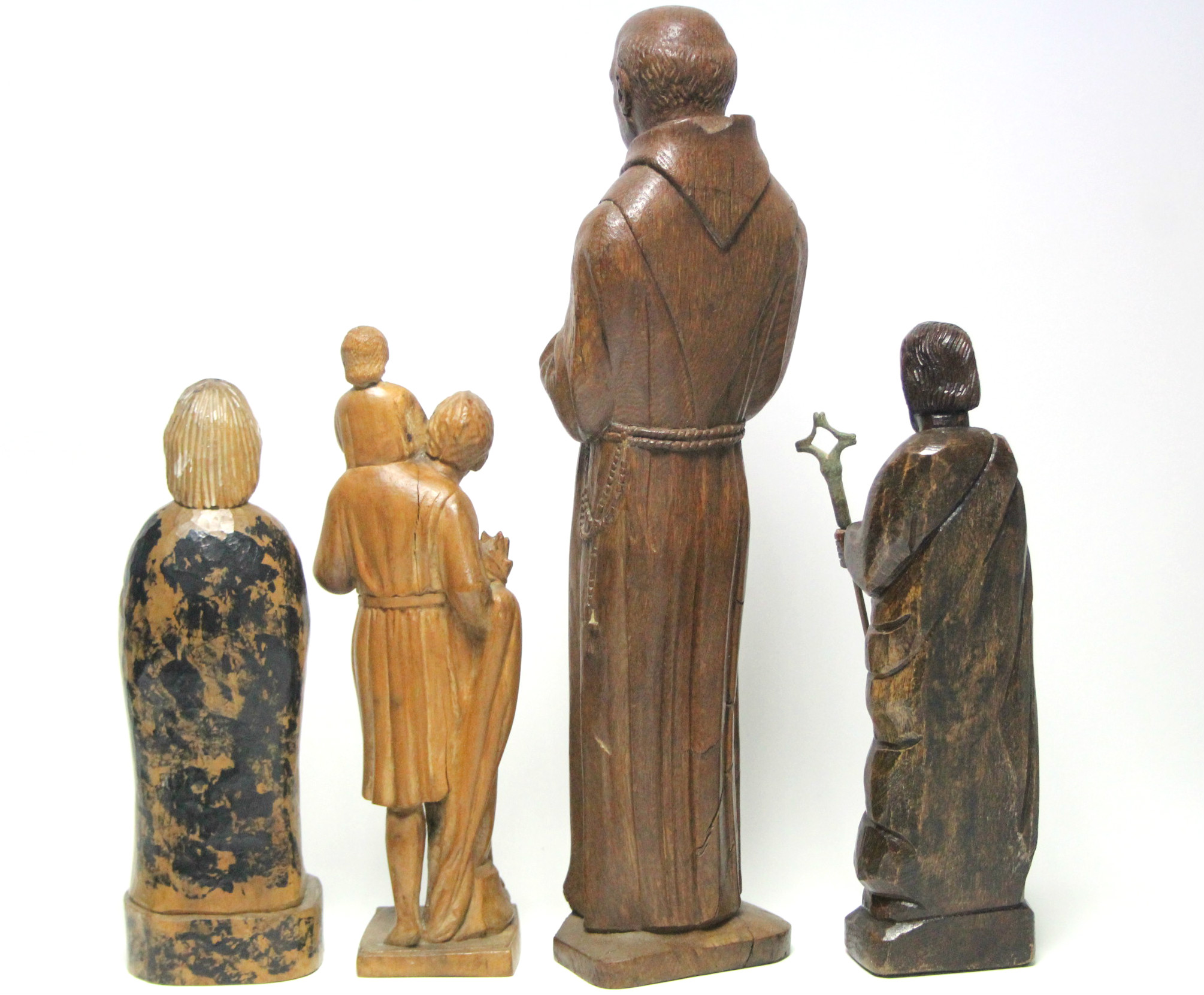 A carved oak standing figure of a monk, 20” high; & three other smaller carved wood religious - Image 3 of 4