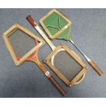 Two vintage wooden tennis rackets; a Dunlop badminton racket, each with wooden press; various