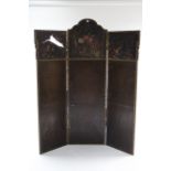A late 19th/early 20th century brass studded & carved wooden frame three-fold draught screen with