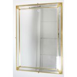 A gilt frame rectangular wall mirror with bevelled border, 41” x 29”.