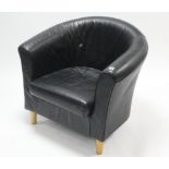 A black leatherette tub-shaped chair, on short round tapered legs.