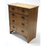 A late Victorian oak chest fitted two short & three long graduated drawers with iron swing