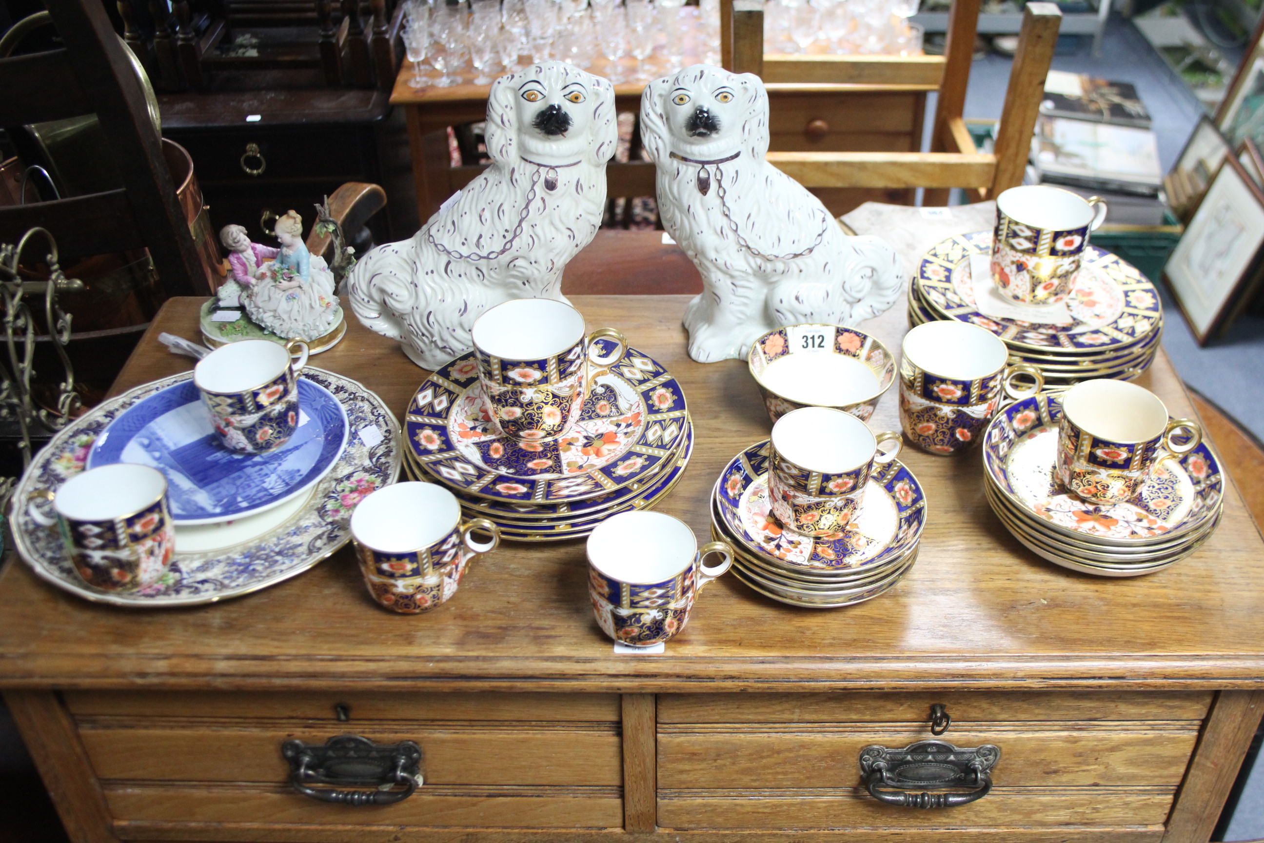 An Imari pattern matched thirty-one piece part tea & coffee service; a pair of Staffordshire pottery