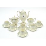 A Wedgwood fifteen piece coffee service with green & blue foliate border; & various items of