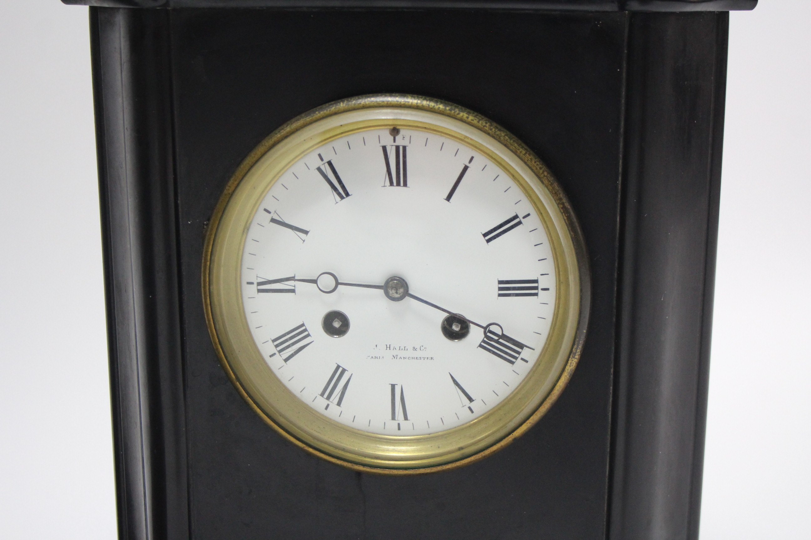 A 19th century mantel clock with black roman numerals to the white enamel dial signed “HALL & Co. - Image 2 of 3