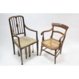 A late 19th century beech bow-back elbow chair inset woven-cane & on turned tapered legs; & an
