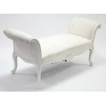 A 19th century continental-style white painted & carved wooden frame window seat, the padded