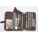 A Waltmaan & Son’s nine-piece kitchen knife set, with case, as-new.