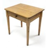 A pine side table fitted frieze drawer & on square chamfered tapered legs, 30¼” wide.