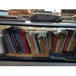 A collection of assorted art books & other volumes.