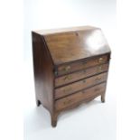 A Georgian inlaid figured-mahogany bureau with fitted interior enclosed by fall-front above four