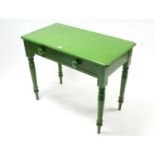 A Victorian green painted pine side table fitted frieze drawer & on turned tapered legs, 36” wide.