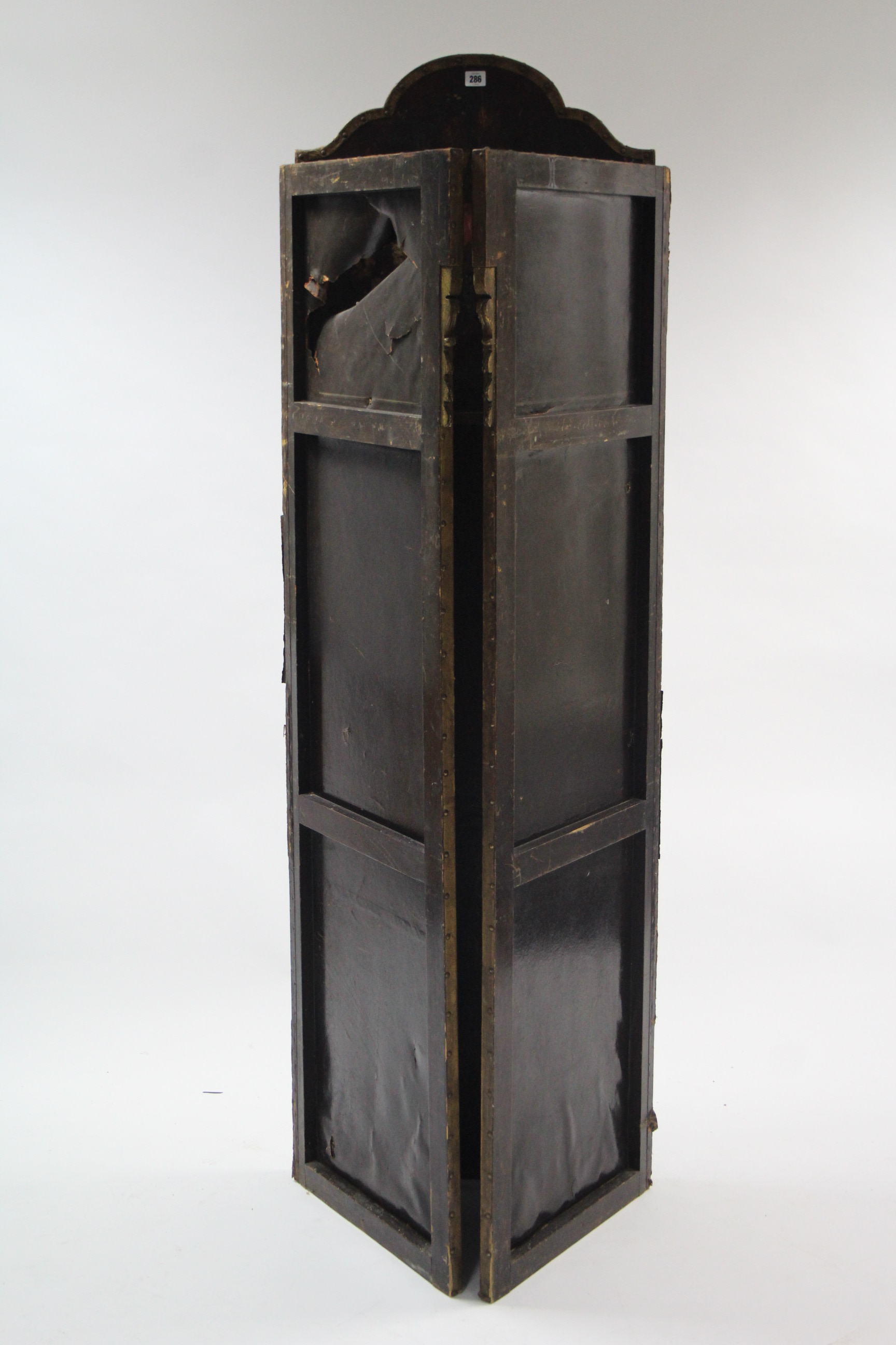 A late 19th/early 20th century brass studded & carved wooden frame three-fold draught screen with - Image 2 of 2
