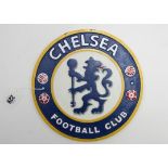 A modern painted cast-iron plaque “CHELSEA FOOTBALL CLUB”, 9½” diam.