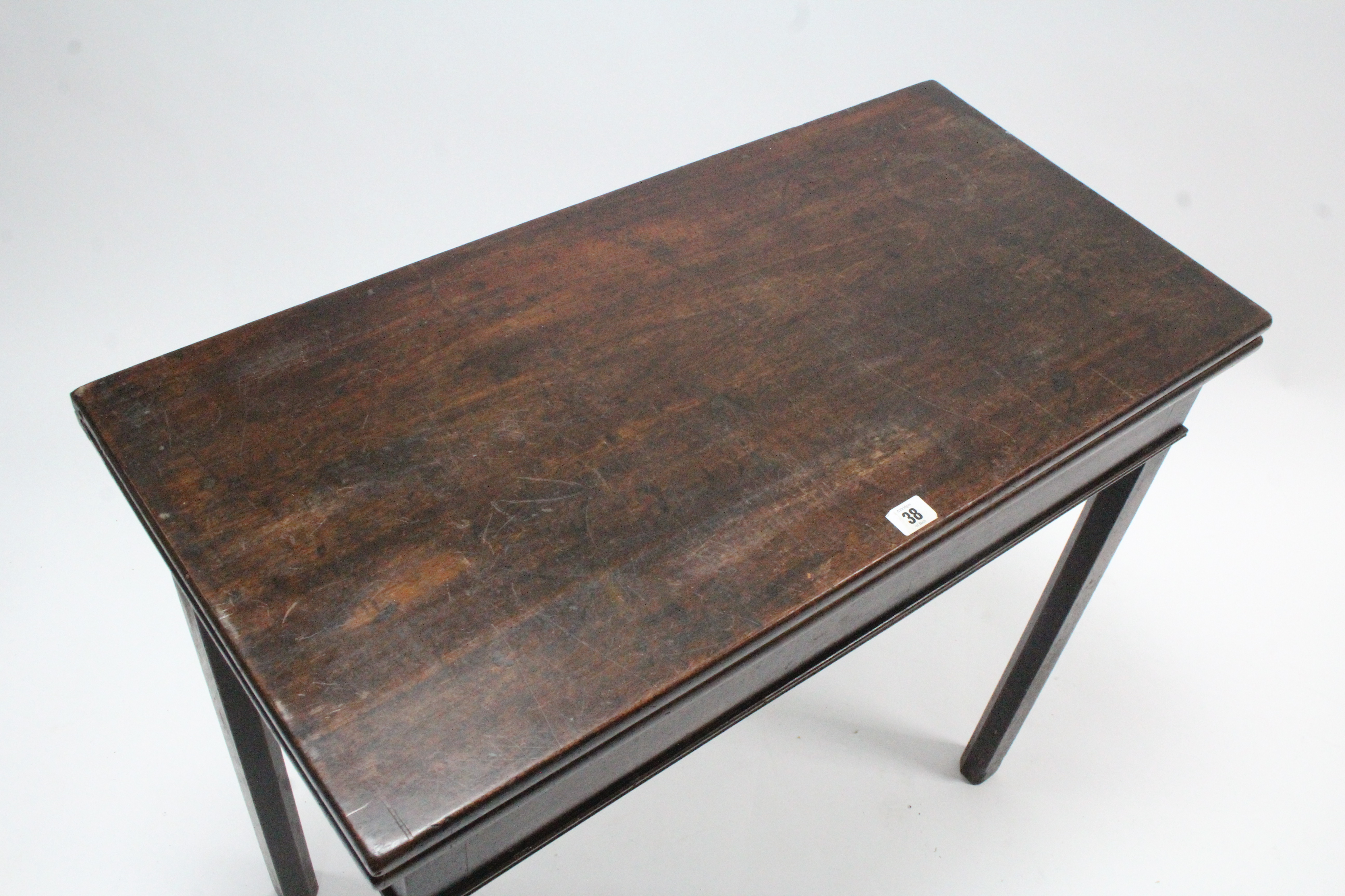 A 19th century mahogany tea table with rectangular fold-over top & on square chamfered legs, 32” - Image 2 of 4